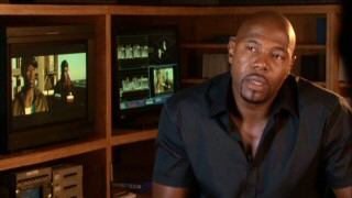 In one of the DVD's four featurettes, director Antoine Fuqua discusses his film next to monitors paused on a shot of Don Cheadle and Wesley Snipes.