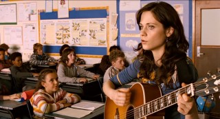 Either Jess's school has music class more than once a week or his feelings towards pretty music teacher Ms. Edmonds (Zooey Deschanel) merit more screen time.
