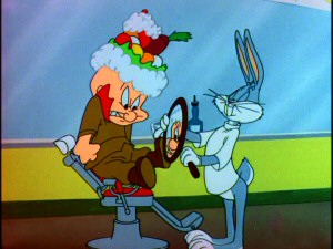 Elmer Fudd is anything but pleased with the fruit arrangement his barber has given him in "The Rabbit of Seville."