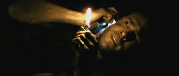 Ryan Reynolds plays Paul Conroy, a kidnapped civilian contractor who finds himself buried alive in Iraq in the 2010 film "Buried." At least he's got a lighter and a cell phone.