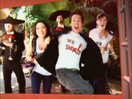 Young people have T-shirt fun in the music video for "We Rock." You suuurrre do.