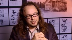 In front of a wall of storyboards, director Christian Alvart discusses his methods in "Filed Under 'Evil'."