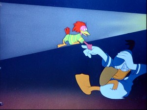 The Aracuan bird that would later torment Donald in turn-of-the-21st-century TV cartoons steps out of his film to shake the duck's hand near the beginning of "The Three Caballeros."