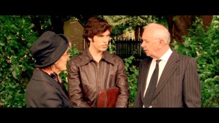 To free up his buddy, Bruce (Tom Hughes) tries selling insurance to elderly folks standing outside a funeral service in this deleted scene.