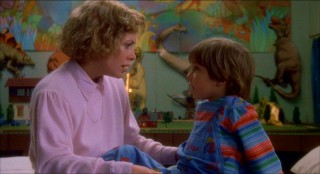 Mother (Catherine Hicks) and son (Alex Vincent) have a heart-to-heart, as they always do in '80s horror films. None of the Camden kids ever got in this kind of trouble!