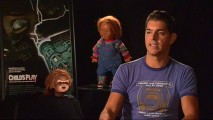 With Chucky and spare head keeping watch behind him, writer Don Mancini is sure not to embellish the story of production for "Evil Comes in Small Packages."