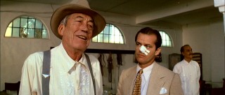 Though he appears in just two scenes, John Houston's loathsome, powerful character Noah Cross was deemed one of cinema's all-time greatest villains by the American Film Institute in 2003. (Meanwhile, an attentive Jack Nicholson rocks out in his nose bandage.)