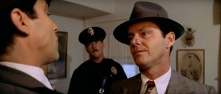 Jake has a reputation for being a nosy fellow, sticking his nose in official police business like a kitty cat.