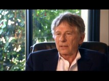 U.S. fugitive and Academy Award-winning director Roman Polanski is one of four darkly-clad men appearing in the DVD's three featurettes.