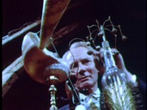 Inventor Roland Emmett surveys one of his many peculiar creations made specifically for the film in "The Ditchling Tinkerer."