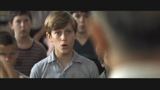 Morhange adds his phenomenal singing talents to the chorus' voices.