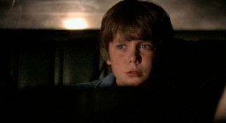 Child actor Harley Cross claims third billing as 9-year-old back seat abductee Travis Knight, who looks for escape opportunities.