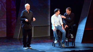 As Brad questions a young mall cop from the audience, Colin interprets the interview for the hearing impaired.