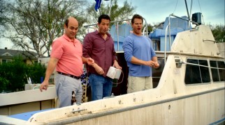 The leading men of "Cougar Town" (Ian Gomez, Josh Hopkins, and Brian Van Holt) enjoy a round of Penny Can on Bobby's landlocked boat ironically titled "Jealous Much?"