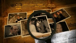 "The Counterfeiters" DVD's 16x9 main menu changes as the magnifying glass inspects its contents.