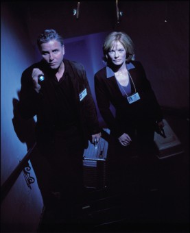 The two leads of "CSI" give a dark, atmospheric examination room pose. She (Marg Helgenberger) was nominated for an Emmy in Season 1, he (William Petersen) wasn't.