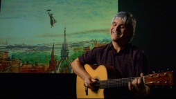 Former Wings guitarist Laurence Juber blissfully shows off his full fingerstyle rendition of "A Spoonful of Sugar" via the Sherman Brothers' Jukebox.