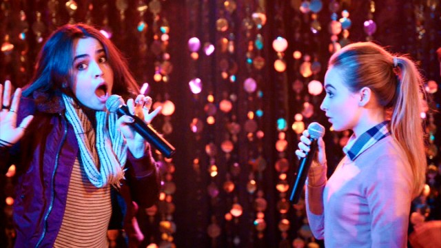 Lola Perez (Sofia Carson) and Jenny Parker (Sabrina Carpenter) take each other on in a rap battle.