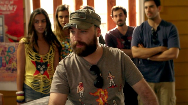 Bearing a striking resemblance to Zach Galifianakis in "The Hangover Part II", Pollo (Nicols Martnez) tries to buy funicular tickets for him and his friends in the Chilean thriller "Aftershock."