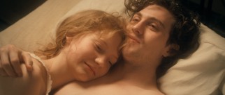 While they fool around and make plans for America, Joe (Aaron Johnson) and Helen (Mia Wasikowska) aren't opposed to exploiting Albert Nobbs on the side.