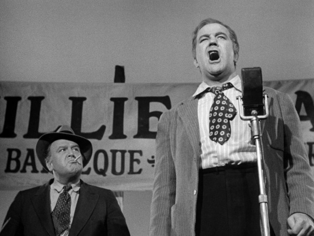 A hungover Willie Stark (Broderick Crawford) speaks from the heart at a public barbecue in "All the King's Men."