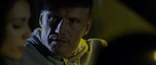 DEA agent Evan Maxwell (Dolph Lundgren) worries about the danger that his girlfriend's undercover work puts her in.
