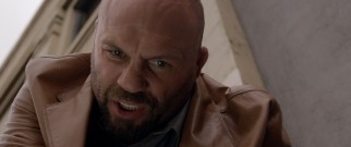 Detective Jack Reiley is a tough and dirty cop, or at least that's what Randy Couture is going for.