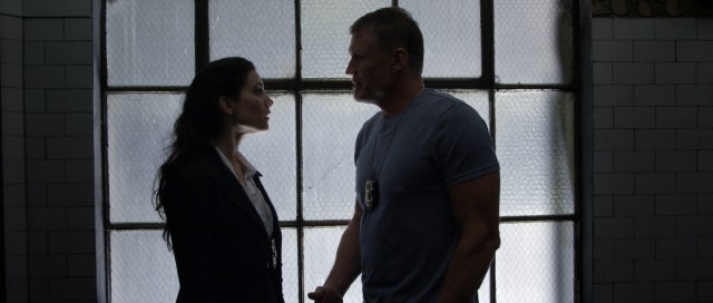 DEA agents Royce (Carly Pope) and Maxwell (Dolph Lundgren) are all in for a big bust in "Ambushed."