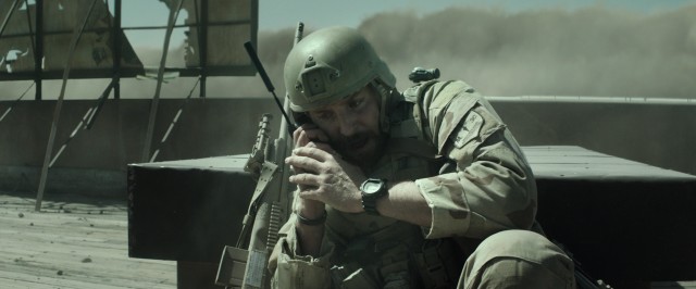 Chris' (Bradley Cooper) harried phone calls from the action amidst gunfire do not put his wife at ease.