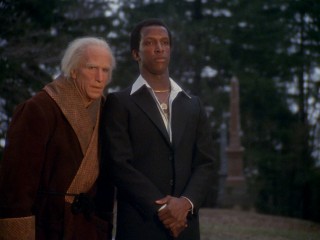 The Ghost of Christmas Future (Dorian Harewood) dresses like a cool guy from the 1970s.
