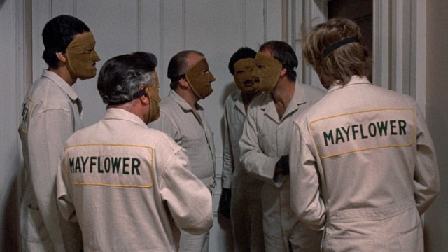 The only thing these masked Mayflower men move are the valuables inside a Manhattan apartment building.