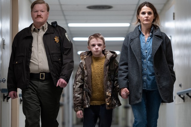 Jesse Plemons, Jeremy T. Thomas, and Keri Russell take a walk down a hall in Scott Cooper's "Antlers."