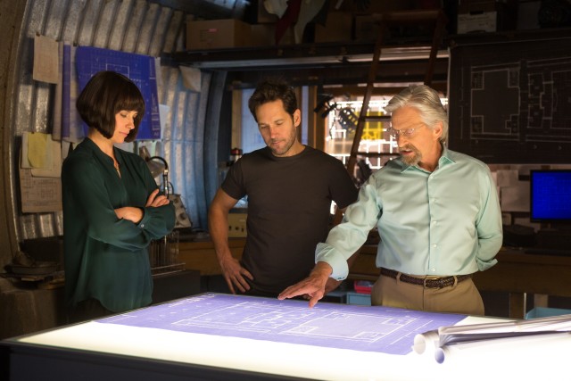To save the world, Hope van Dyne (Evangeline Lilly), Scott Lang (Paul Rudd), and Hank Pym (Michael Douglas) brainstorm.