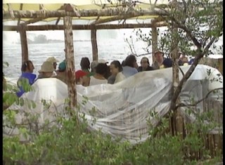 The Arachnophobia cast and crew take shelter from Venezuela rains.