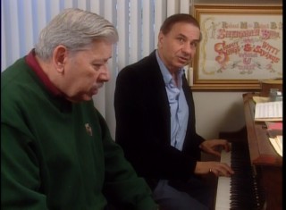 Richard Sherman plays piano and sings, while his older brother Robert stares off into space in "The Aristocrats of Disney Songs."