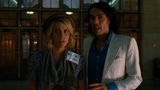 Naomi Quinn (Greta Gerwig) is amazed by the sight of the empty Grand Central Terminal that Arthur (Russell Brand) has arranged for them.