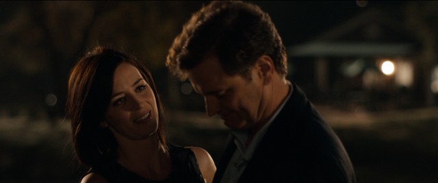 Mike (Emily Blunt) adds ribbing and prying of Arthur (Colin Firth) to their playful night putting at the Terre Haute golf club where he expects to work.