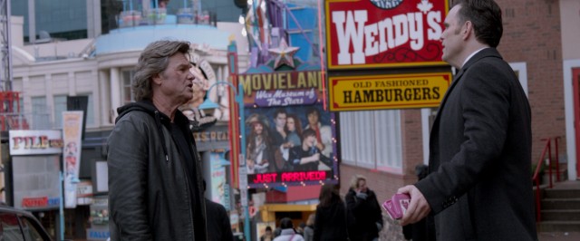 On a Niagara Falls, Ontario street, half-brothers Crunch (Kurt Russell) and Nicky (Matt Dillon) argue over whether to get Wendy's before or after a visit to Movieland Wax Museum of the Stars. (Not really.)
