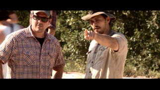 A costumed James Franco directs a non-period crew member in the "As I Lay Dying" behind-the-scenes featurette.
