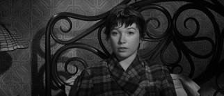 Fran Kubelik (Shirley MacLaine) spends Christmas in the bed and bathrobe of C.C. Baxter.