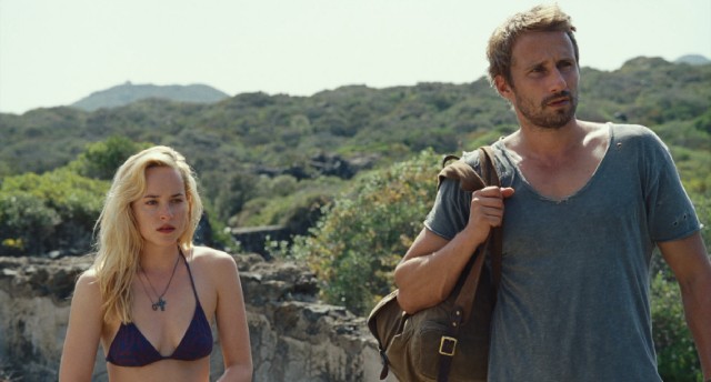 Paul (Matthias Schoenaerts) and Penelope (Dakota Johnson) encounter some questionable company on a hike in "A Bigger Splash."