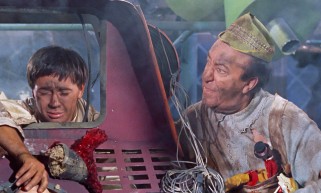 Apprentice Grumio (Tommy Kirk) and his master Toymaker (Ed Wynn) make a mess out of Toyland in the film's final act.