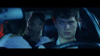 Baby (Ansel Elgort) hears some damning plans in this extended scene.
