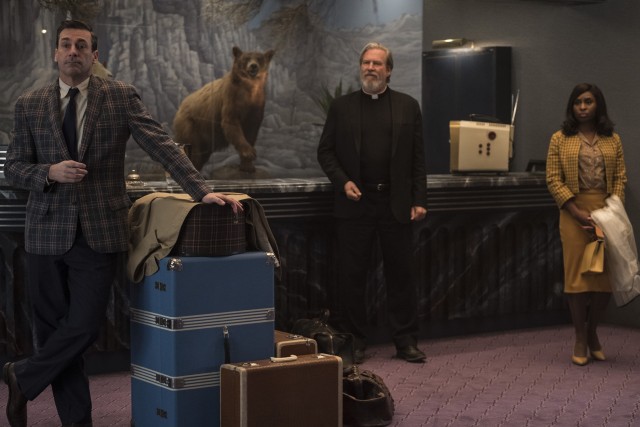Salesman Laramie Seymour Sullivan (Jon Hamm), Catholic priest Father Daniel Flynn (Jeff Bridges), and backup singer Darlene Sweet (Cynthia Erivo) all await checking into Lake Tahoe's El Royale hotel.