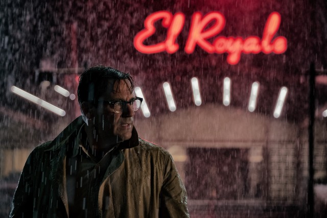 Rain pours down on Laramie Seymour Sullivan (Jon Hamm) on the January 1969 evening in which "Bad Times at the El Royale" is set.