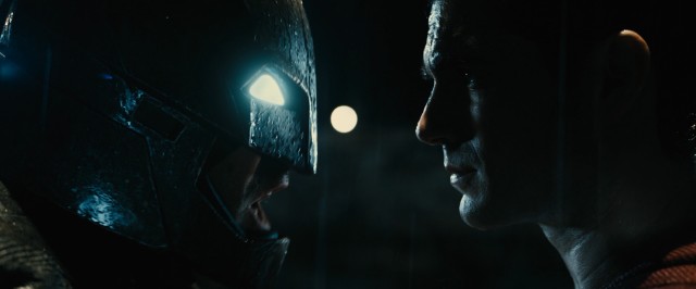 Batman (Ben Affleck) and Superman (Henry Cavill) get real close to one another to battle in "Batman v Superman: Dawn of Justice."