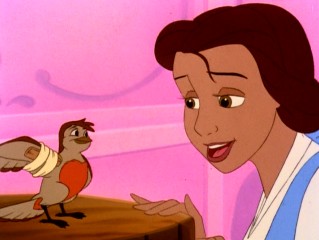 Belle shows this itty bitty injured bird some compassion with a splint.