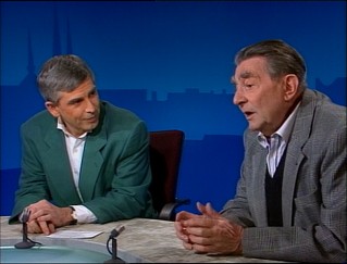 French film critic Joy Hoffmann listens intently while Henri Alekan recalls shooting the film in this 1995 news segment.