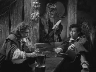 The dealings of Belle's suitor Avenant (also Jean Marais) and brother Ludovic (Michel Auclair) bring her family into financial troubles.