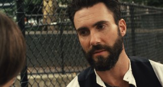 In his acting debut, Maroon 5 singer Adam Levine briefly sports a thick beard as successful singer Dave Kohl.
